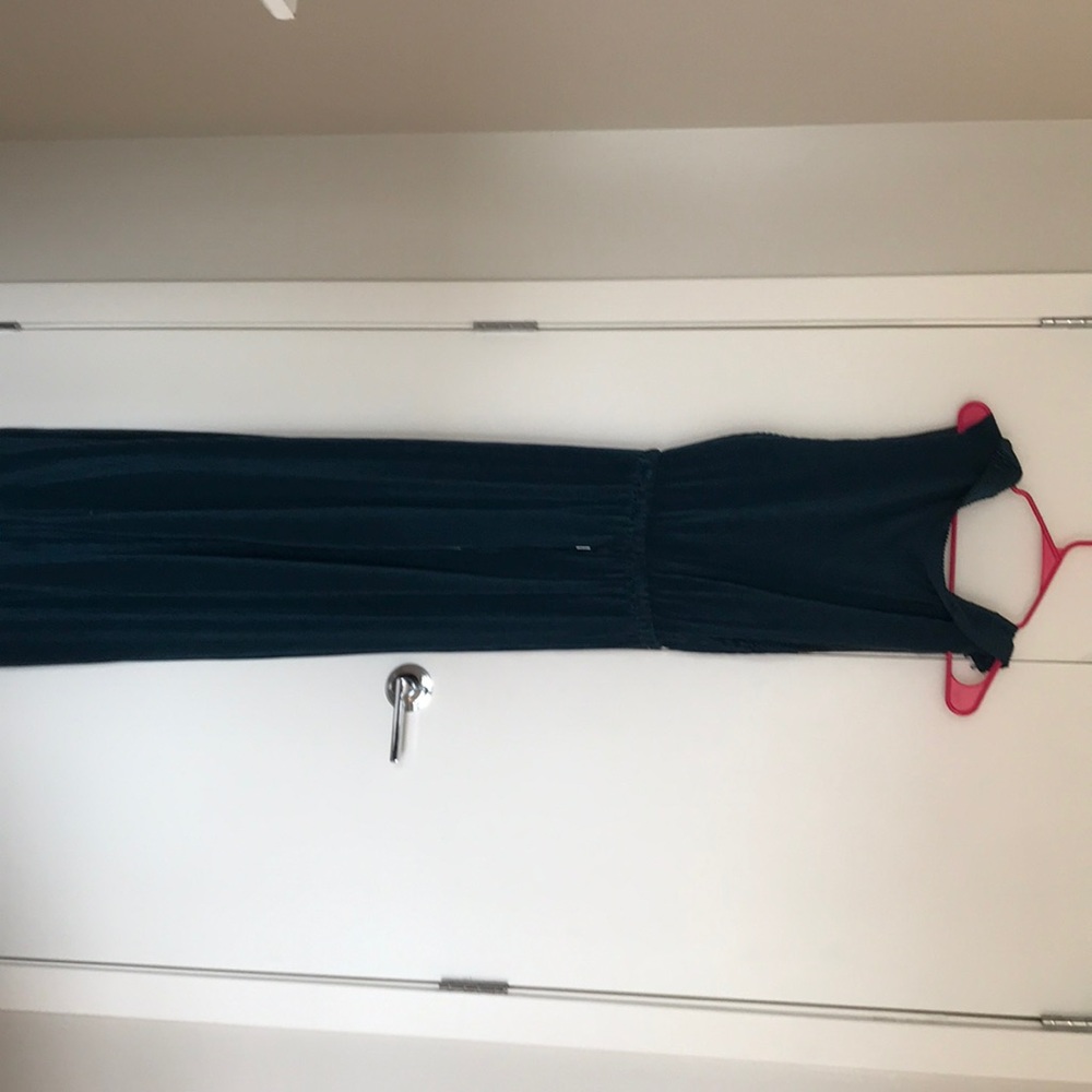 Women’s emerald green jump suit